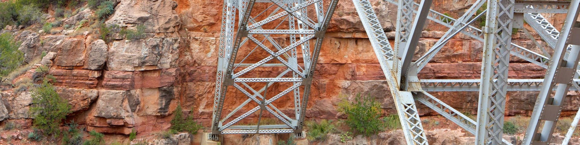 Sedona showing a bridge and a gorge or canyon
