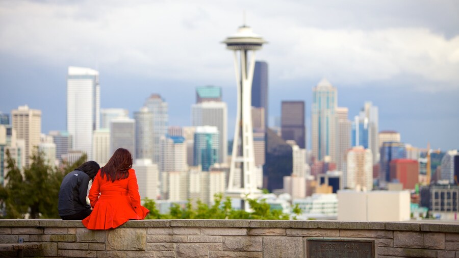 Couple enjoying the iconic skyline view of Seattle from Kerry Park.