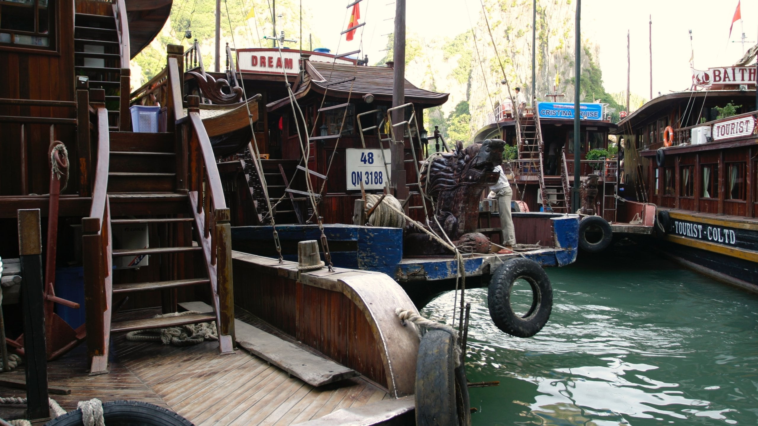 Halong Bay which includes a bay or harbor and boating