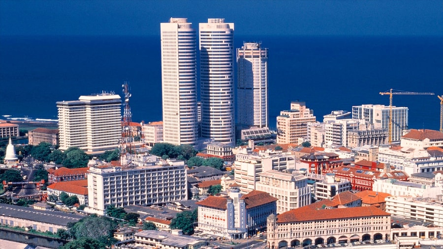 Colombo which includes general coastal views, a skyscraper and a city