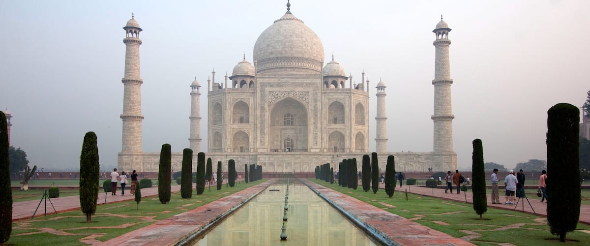 Taj Mahal featuring heritage architecture, a monument and mist or fog