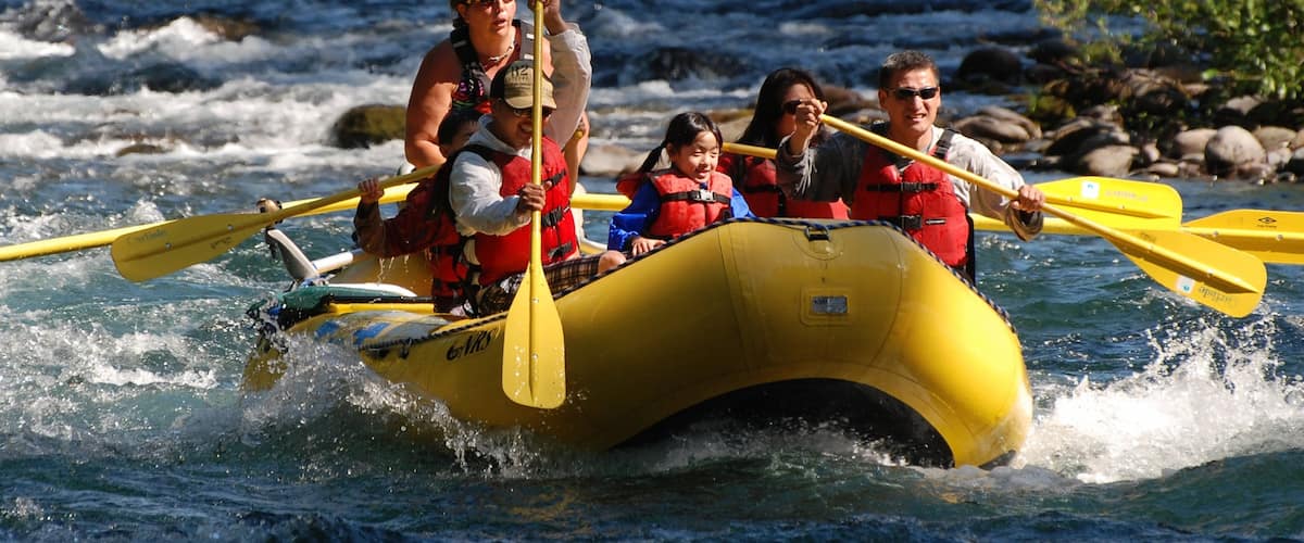 Eugene featuring rafting and rapids as well as a small group of people