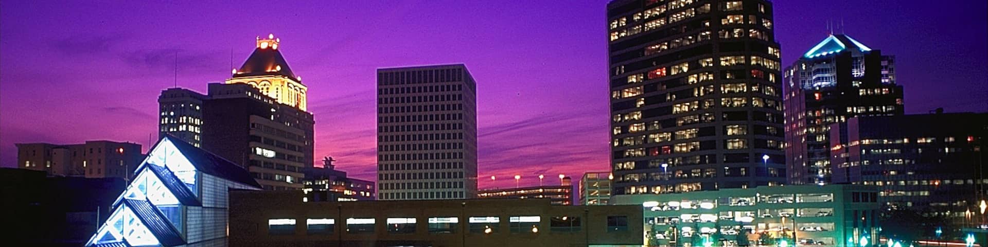 Greensboro showing modern architecture, night scenes and a city