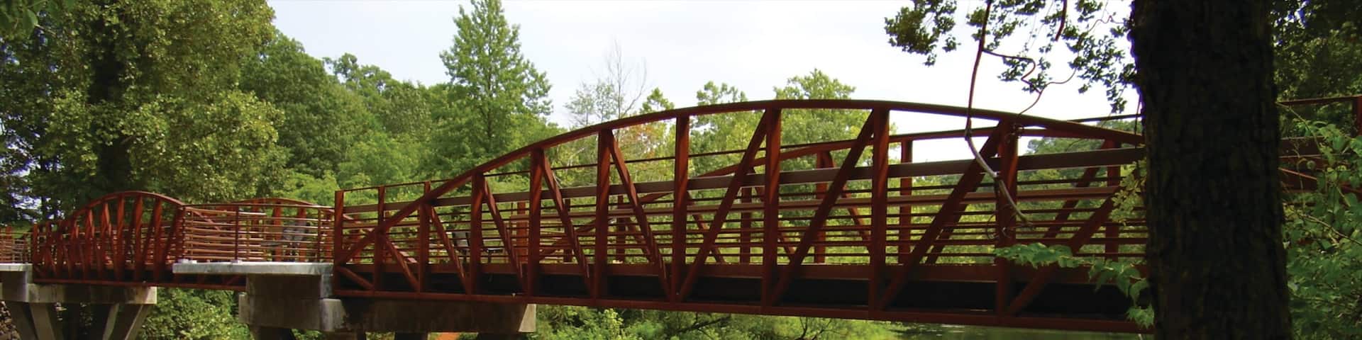 Bentonville - Fayetteville which includes a river or creek, a bridge and a cascade