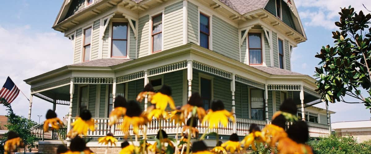 Denton which includes flowers, a house and heritage elements