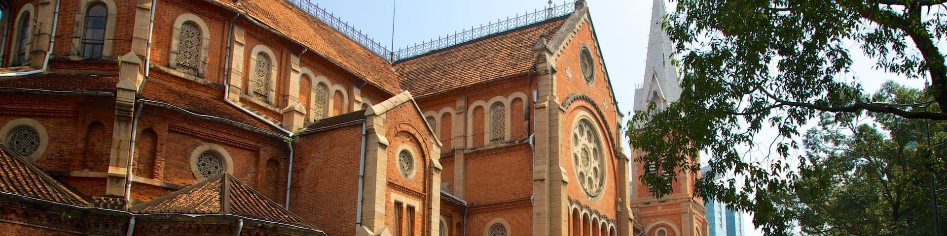 Saigon Notre-Dame Basilica which includes heritage architecture, a church or cathedral and street scenes
