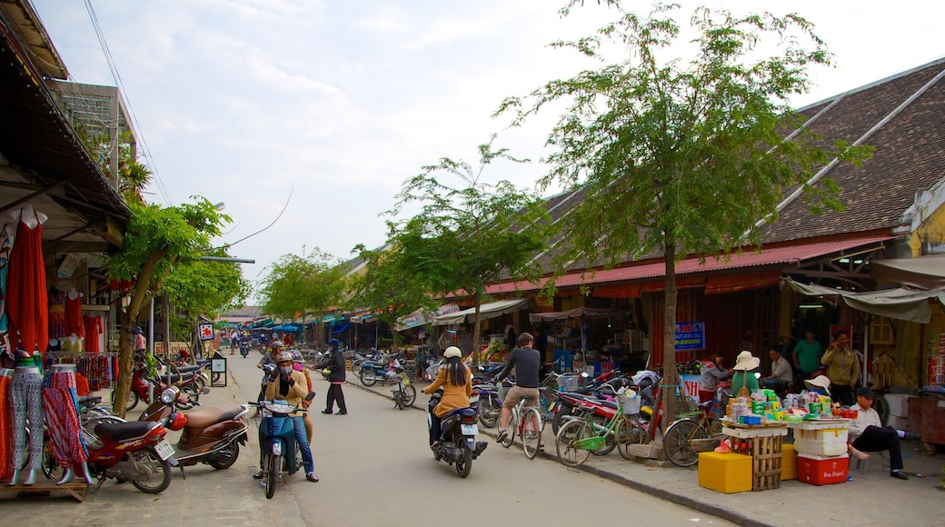 Hoi An City Centre showing markets, street scenes and motorcycle riding