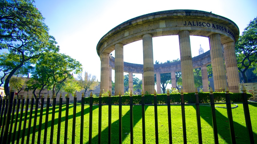 Rotonda de los Hombres Ilustres showing heritage architecture, a garden and a memorial