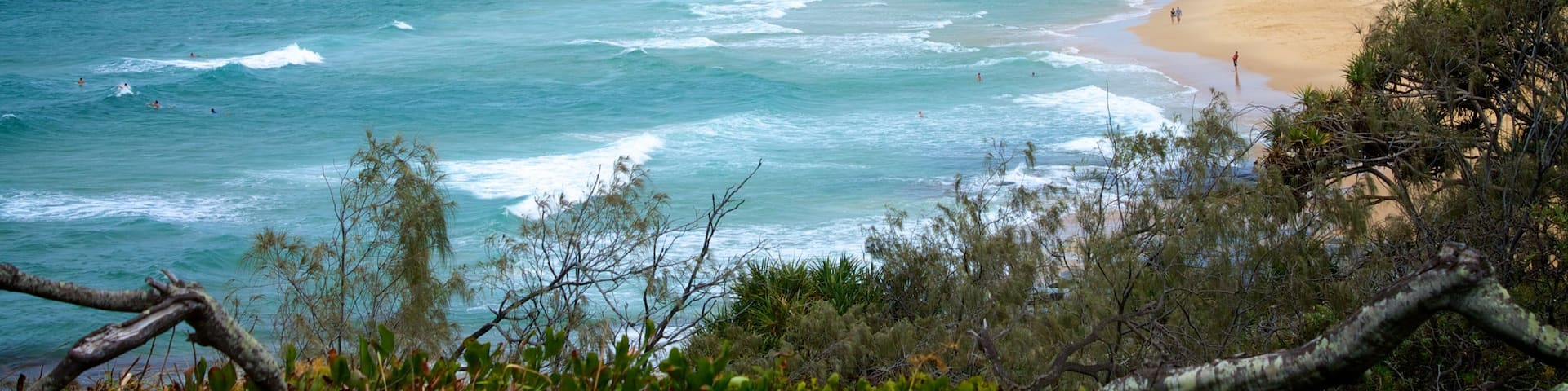 Kawana Beach showing landscape views and a beach