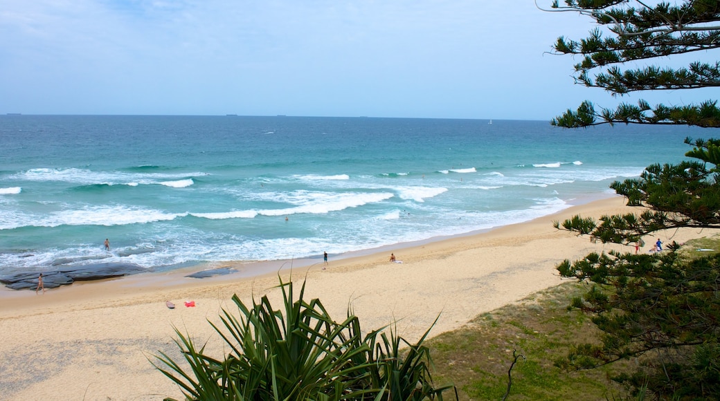 Kawana Beach showing landscape views and a beach