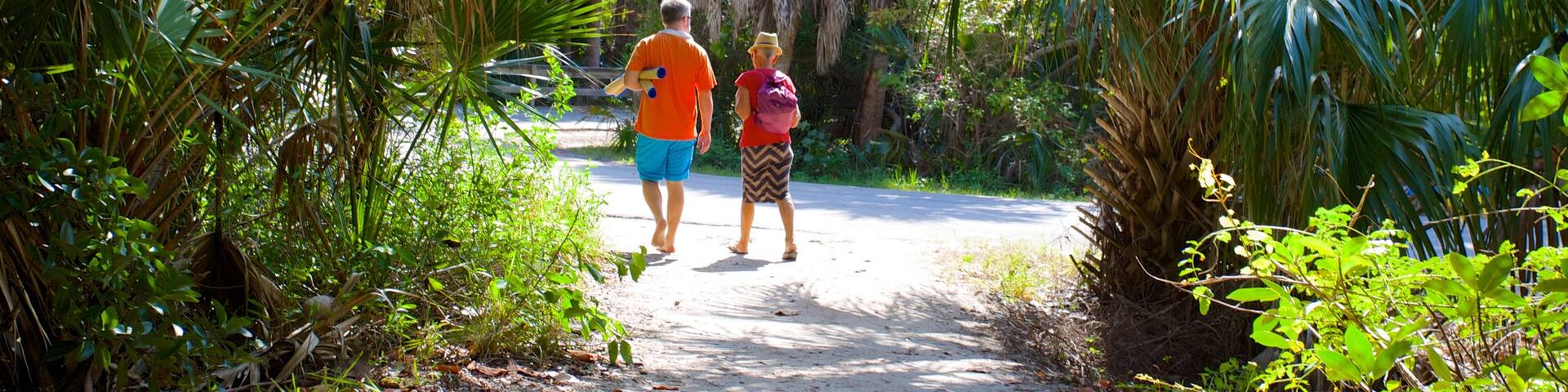 John D. MacArthur Beach State Park showing a park and general coastal views as well as a couple