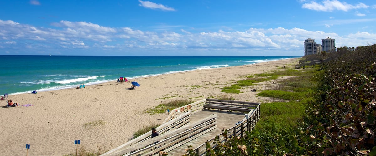 John D. MacArthur Beach State Park featuring a bridge and a beach