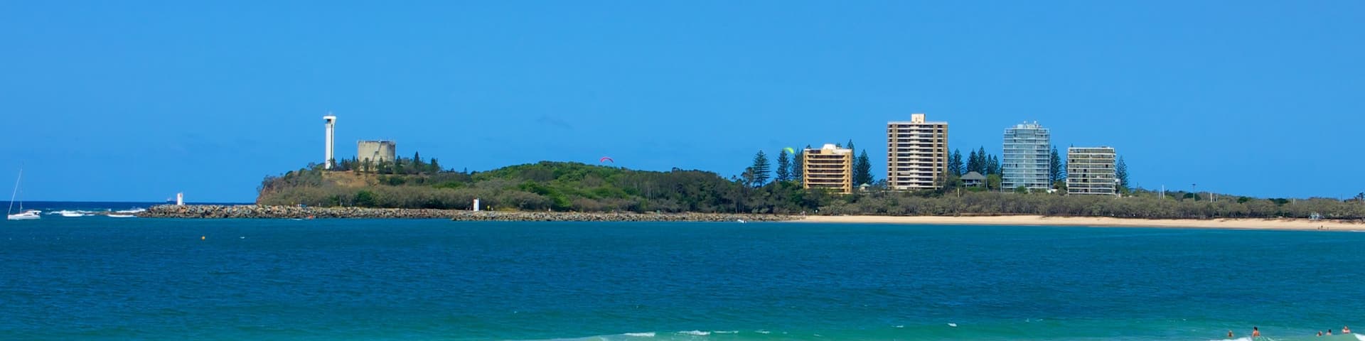 Mooloolaba featuring a beach and a coastal town