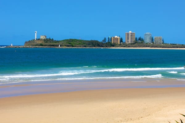 Mooloolaba showing a beach and a coastal town