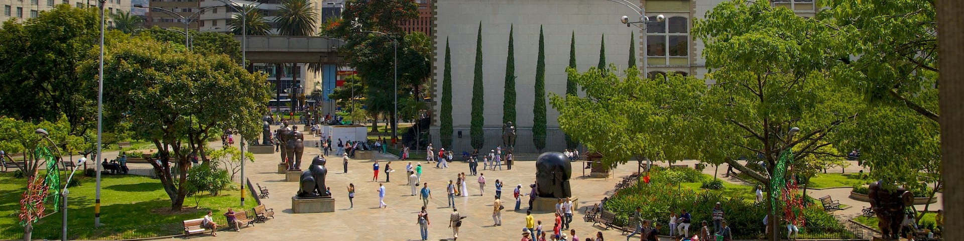 Botero Square Sculpture Park featuring a church or cathedral, a square or plaza and a city