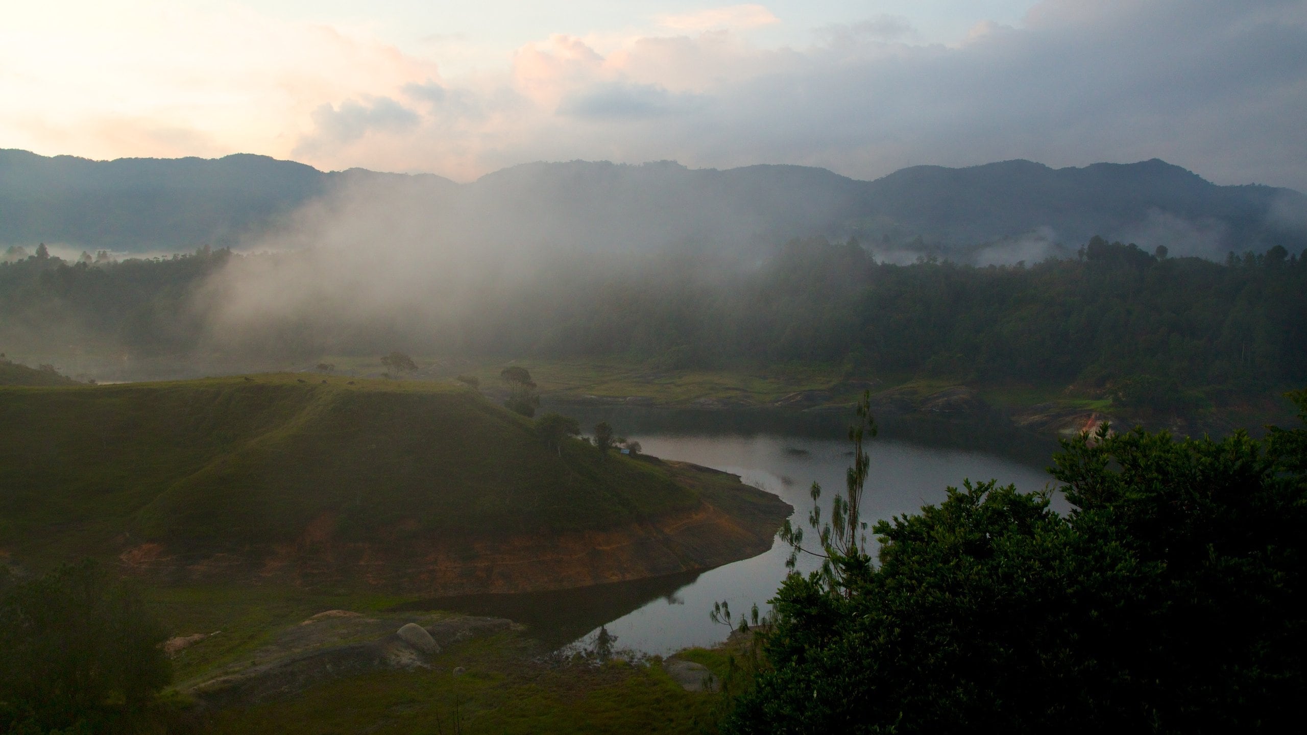 Rock of Guatape which includes mountains, tranquil scenes and landscape views