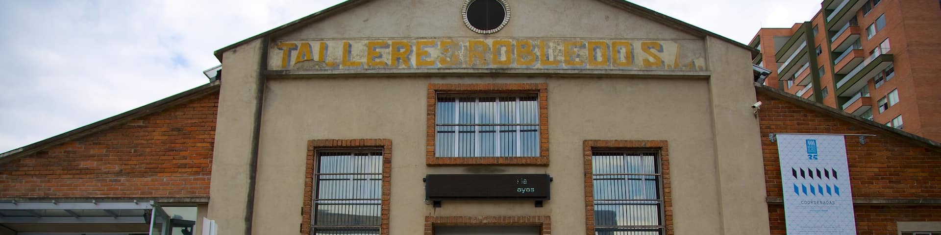 Medellin\'s Museum of Modern Art showing signage and street scenes