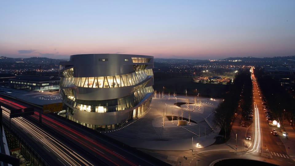 Mercedes Benz Museum showing night scenes, a city and street scenes