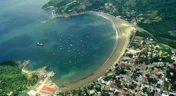 San Juan del Sur featuring a coastal town, a bay or harbour and a sandy beach