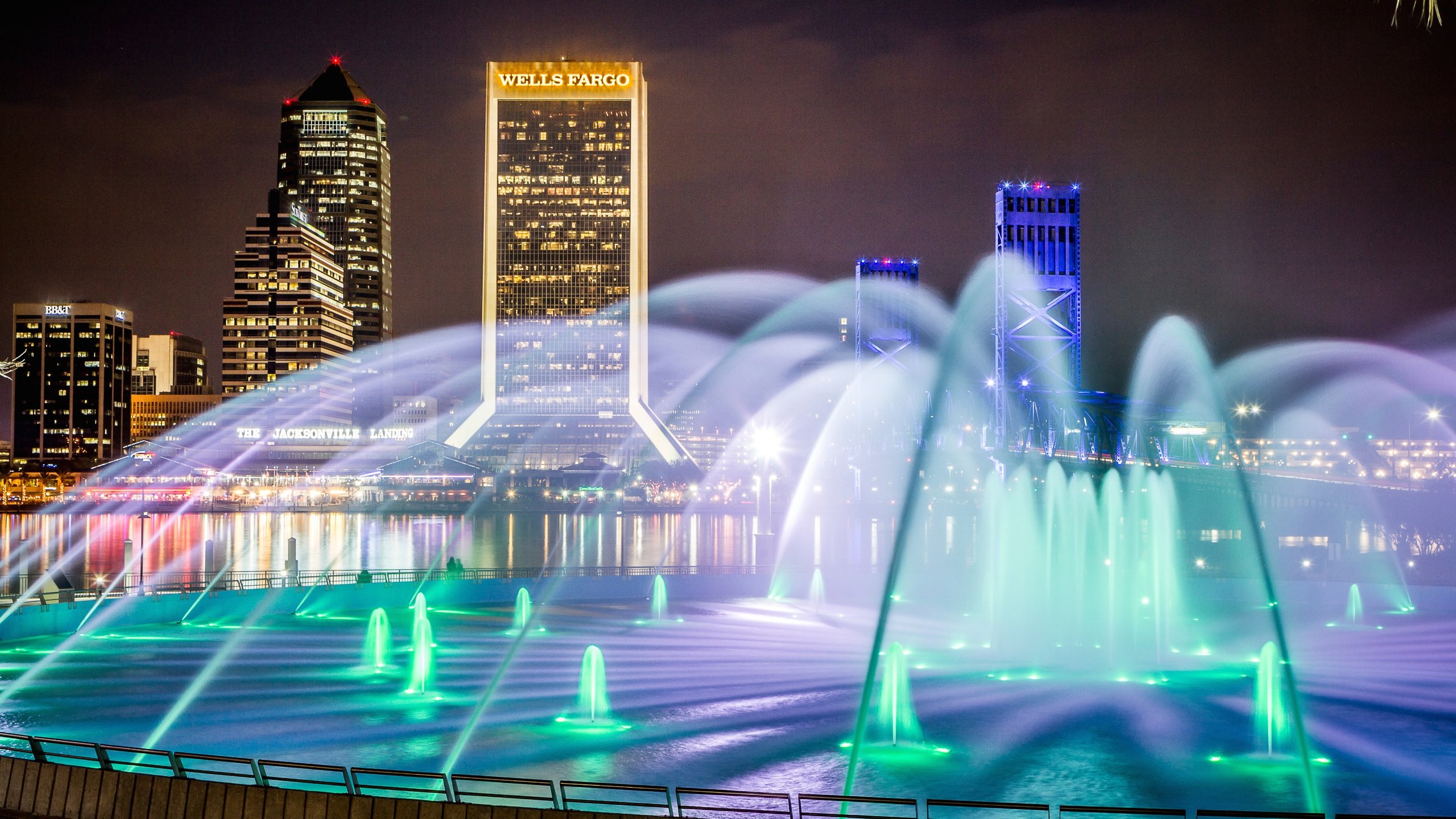 Friendship Park which includes night scenes, skyline and a city