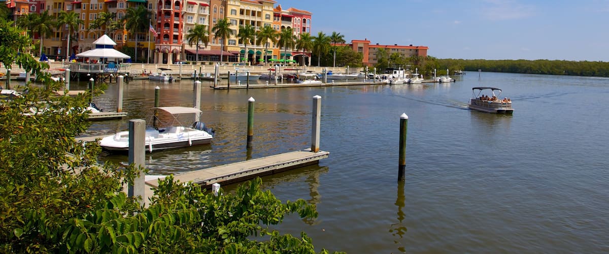 Naples which includes a coastal town, a luxury hotel or resort and a bay or harbor