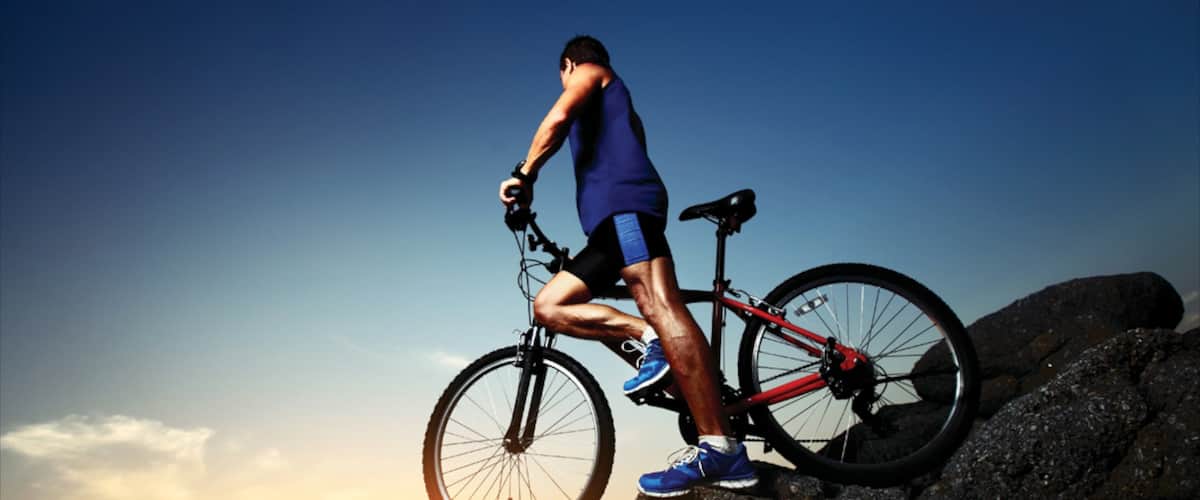 Ontario featuring mountain biking as well as an individual male