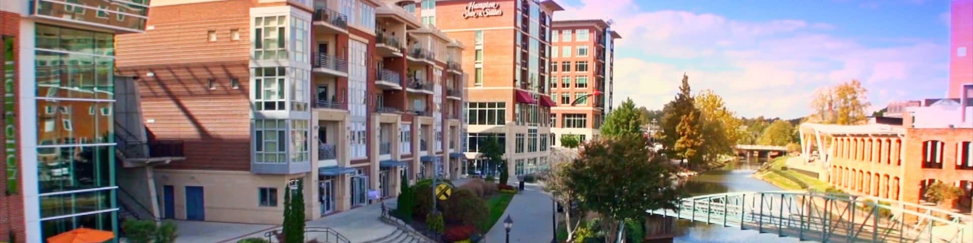 Greenville featuring a bridge, a city and a river or creek
