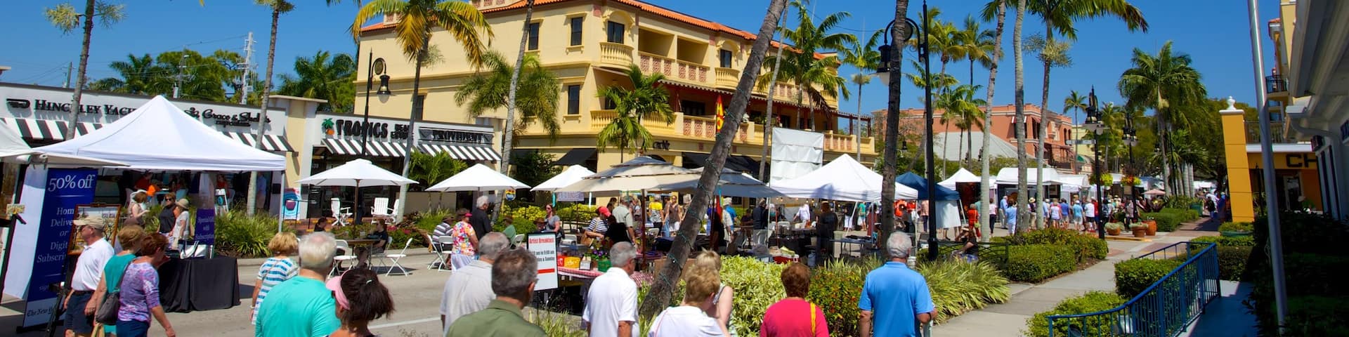 5th Avenue Shopping District which includes markets, street scenes and a city