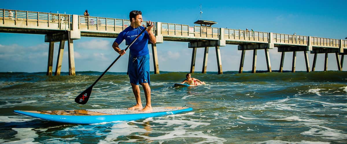 Jacksonville Beach featuring surf, views and surfing