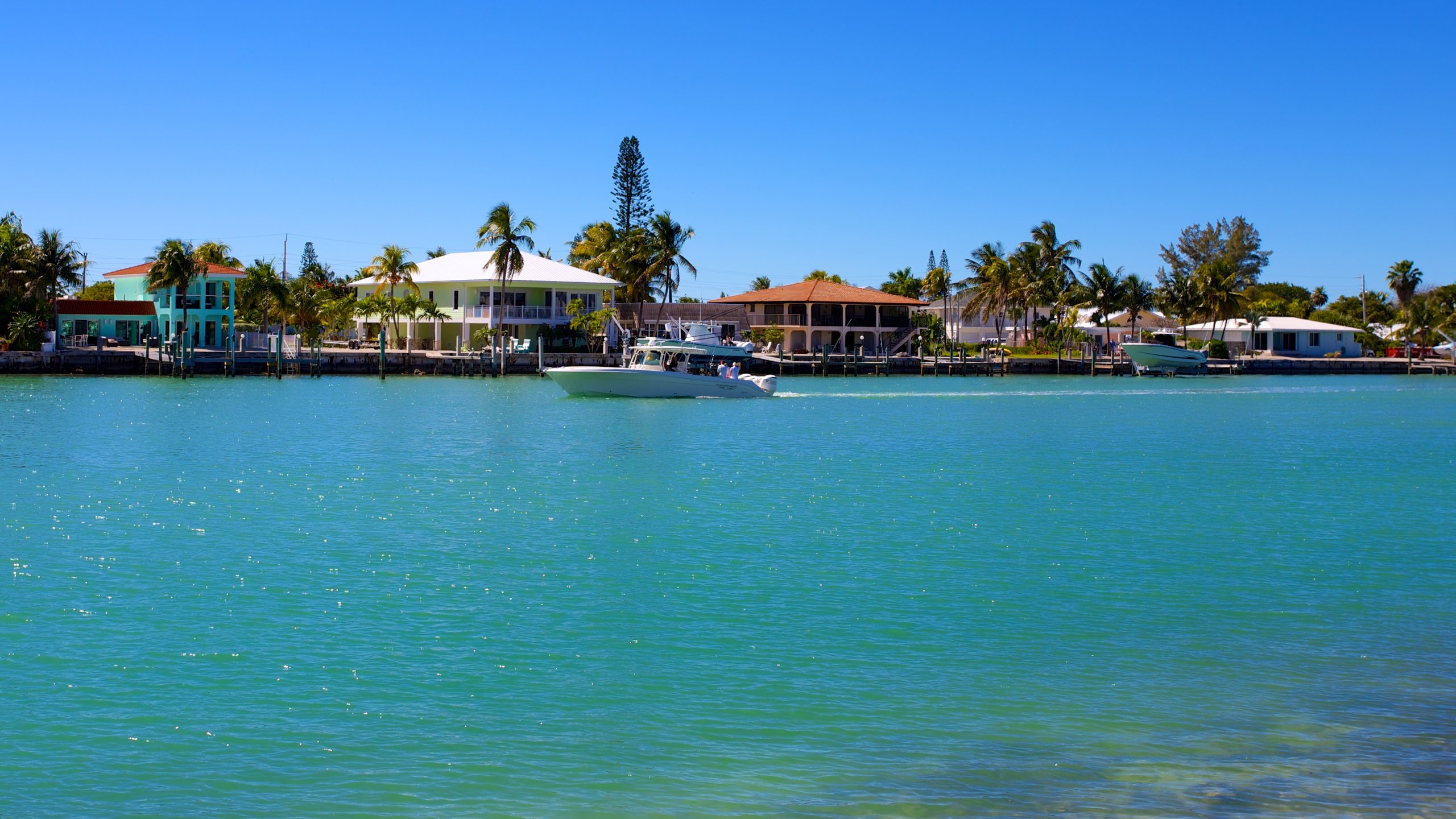 Marathon showing boating, a house and general coastal views