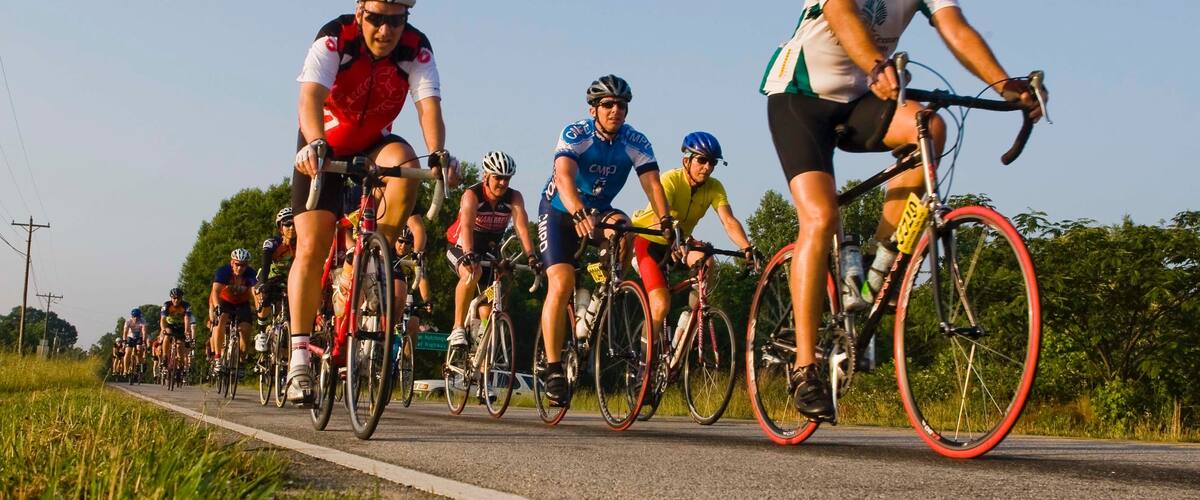 Spartanburg showing a sporting event and road cycling as well as a large group of people