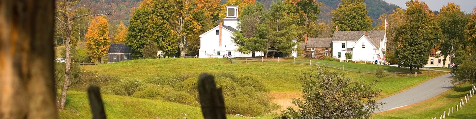 Vermont featuring a garden and a small town or village