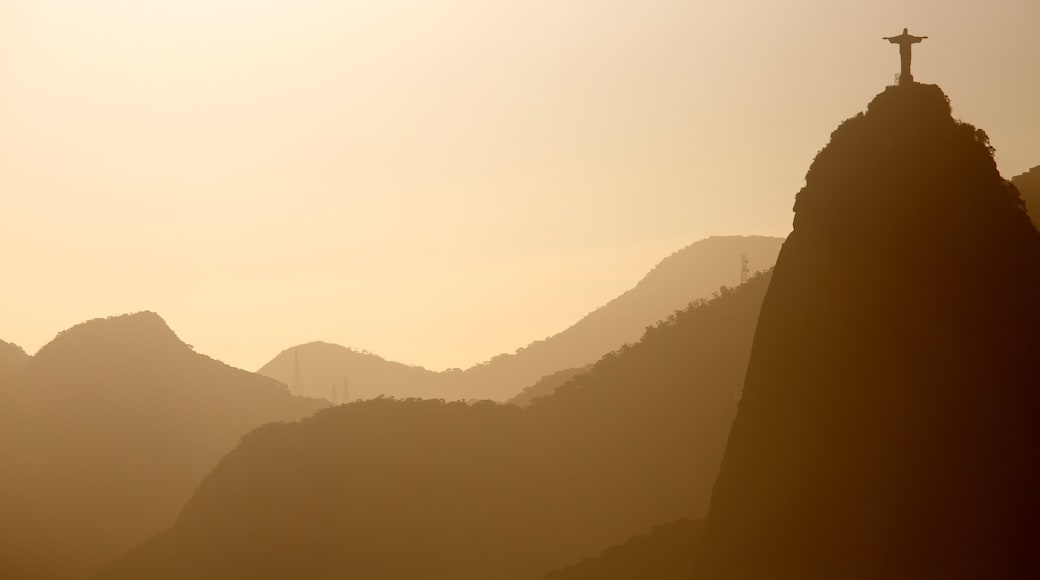 Sugar Loaf Mountain which includes mountains and a sunset
