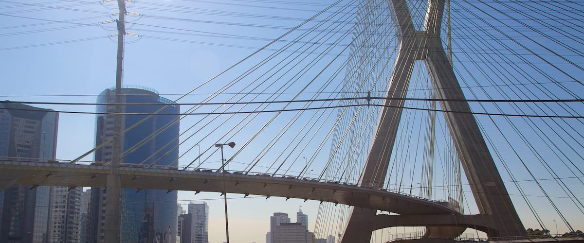 Octavio Frias de Oliveira Bridge featuring a city and modern architecture