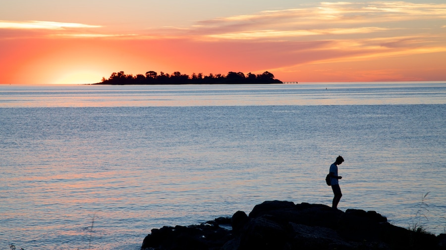 Colonia del Sacramento which includes a sunset and general coastal views