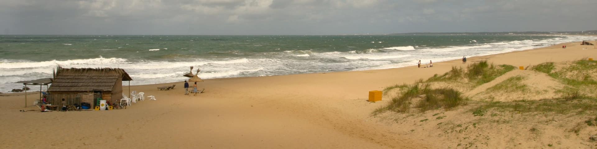 La Pedrera which includes a sandy beach
