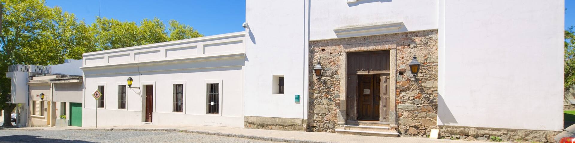 Matriz Church featuring heritage architecture, a small town or village and street scenes