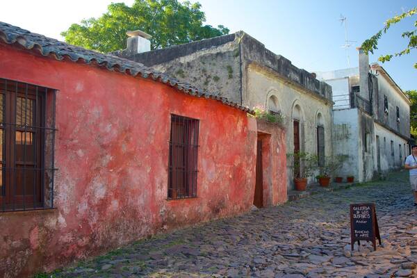 Street of Sighs which includes street scenes, a small town or village and a house