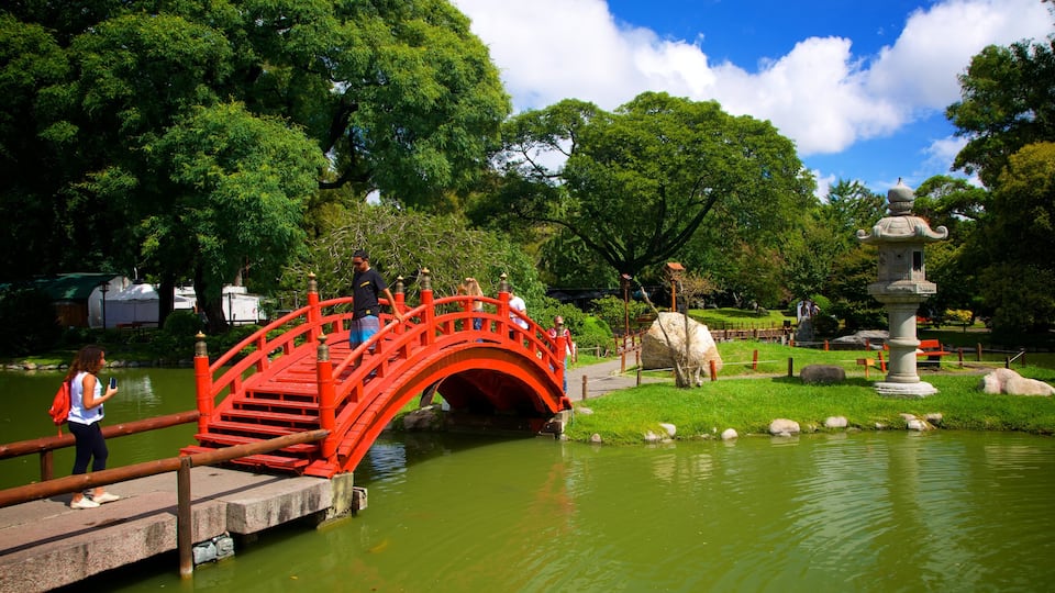 Japanese Garden which includes a pond and a garden