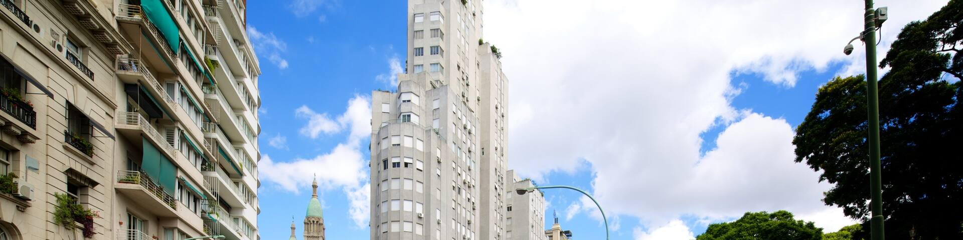 Plaza San Martin which includes a skyscraper, street scenes and a city