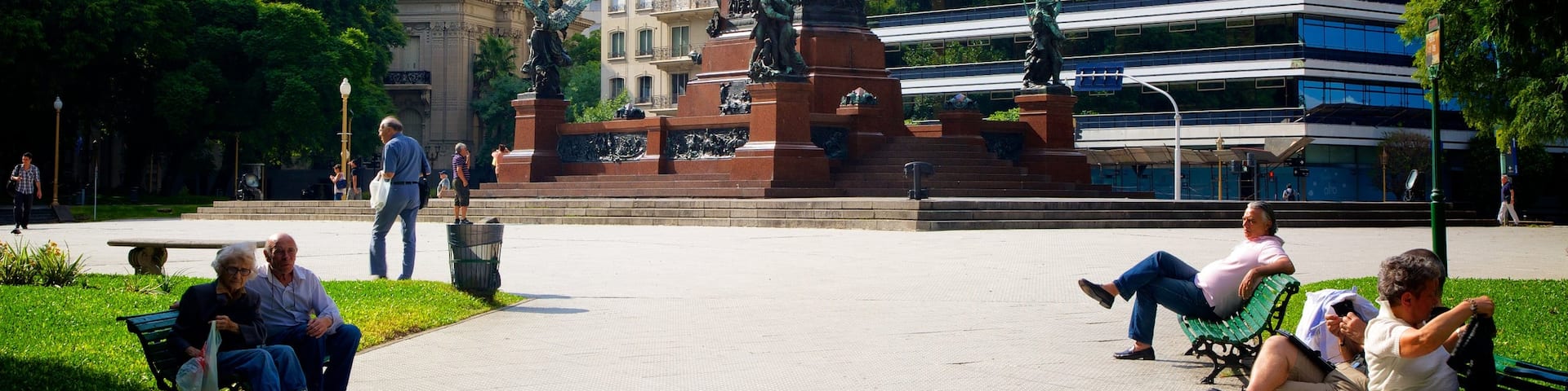 Plaza San Martin which includes a square or plaza, a statue or sculpture and a city