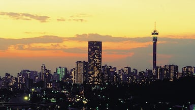 Johannesburg - Gauteng which includes a sunset, skyline and a skyscraper