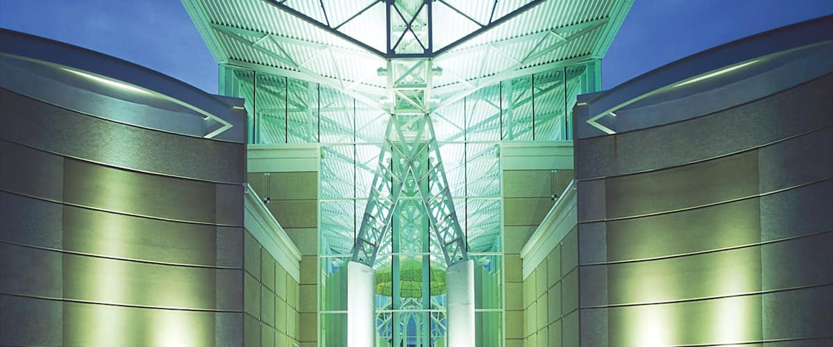 Fayetteville which includes modern architecture and night scenes