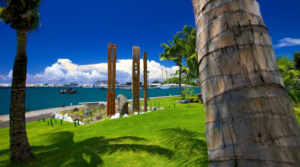 Place Jacques Chirac which includes a garden and general coastal views