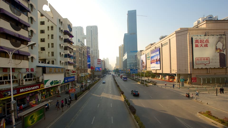 Nanjing which includes a city and street scenes