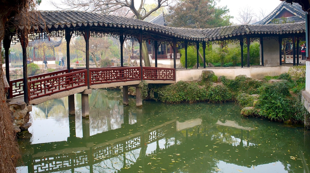 Suzhou showing a pond and a bridge