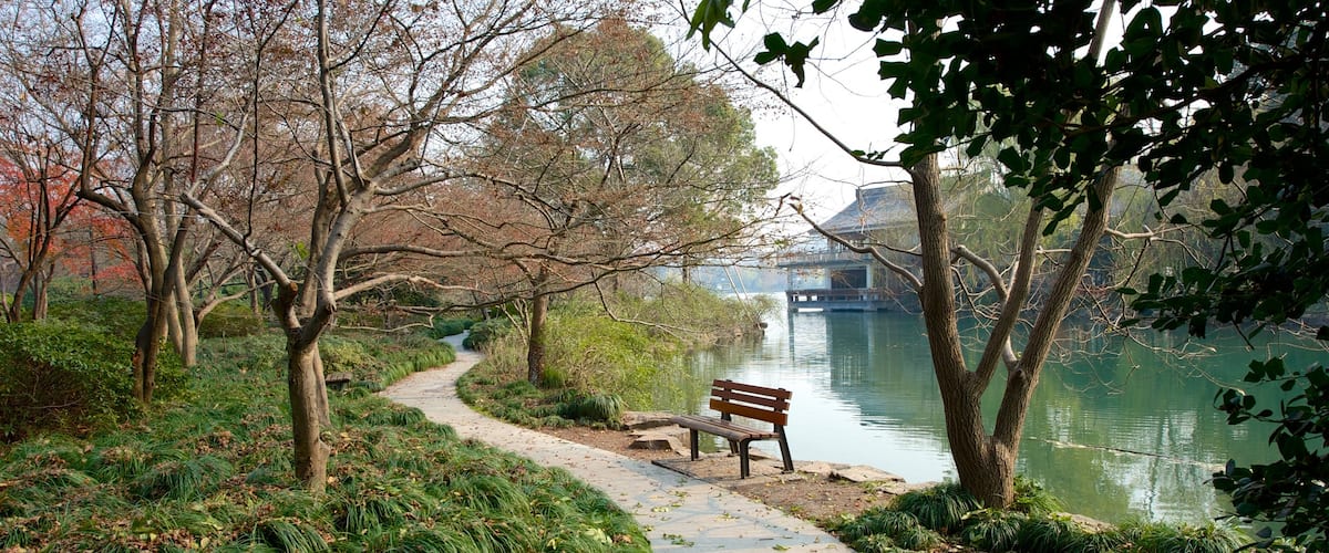 West Lake which includes a lake or waterhole and a garden