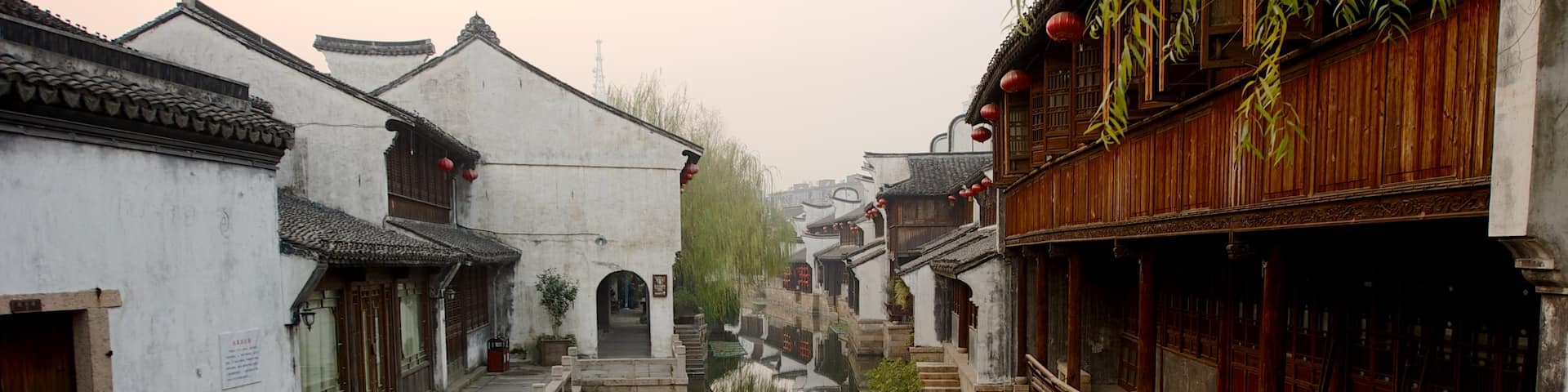 Jiaxing featuring heritage architecture, a small town or village and a river or creek