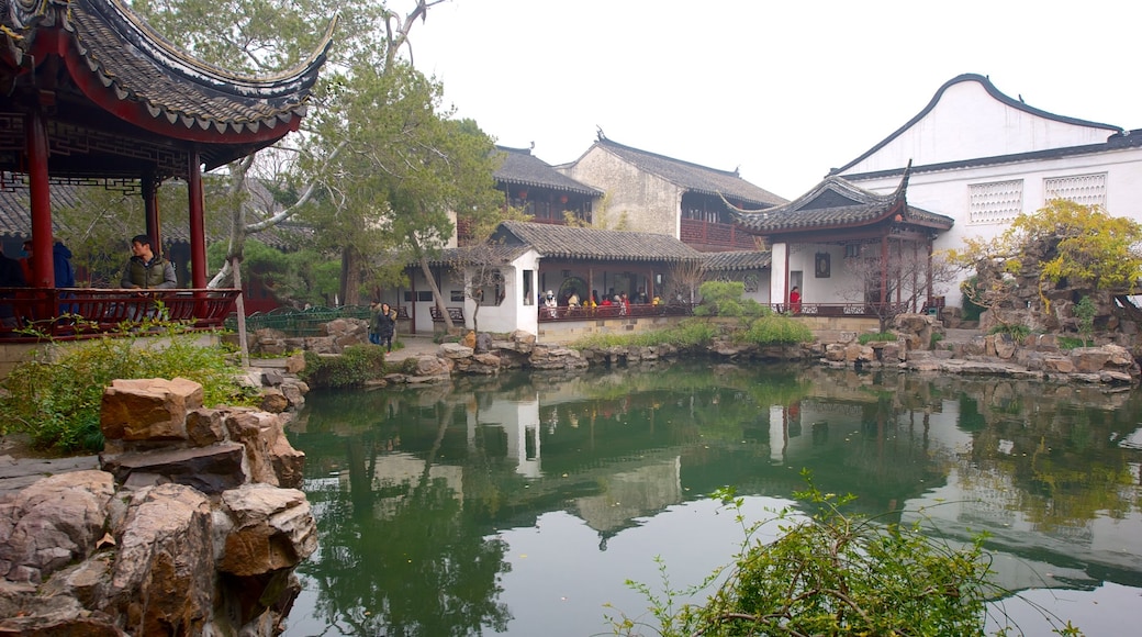 Master of the Nets Garden showing religious aspects, a temple or place of worship and a pond