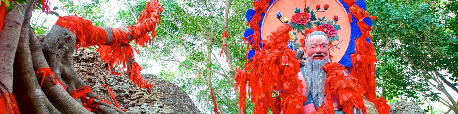 Luhuitou Park which includes a statue or sculpture